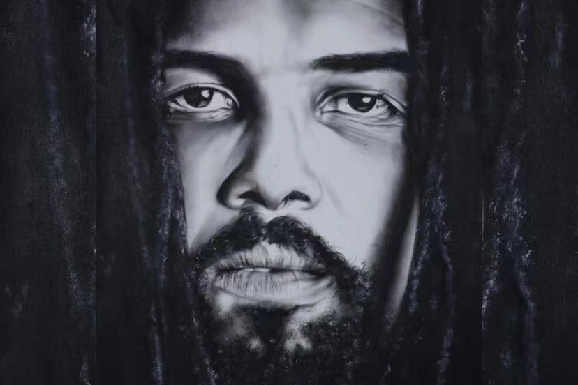 An oil painting of an African man with dreadlocks