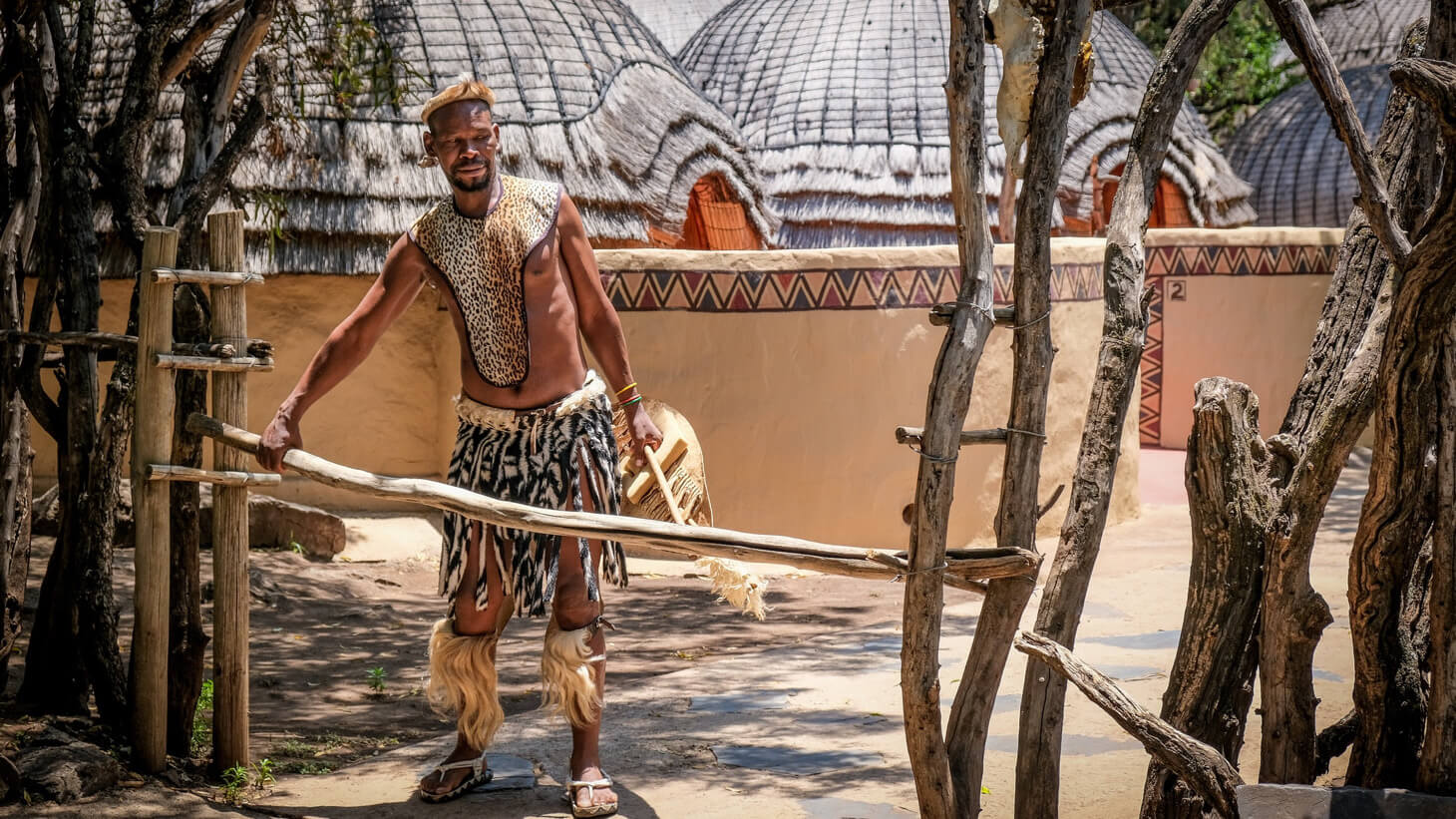 African man dresses in a cultural attire.