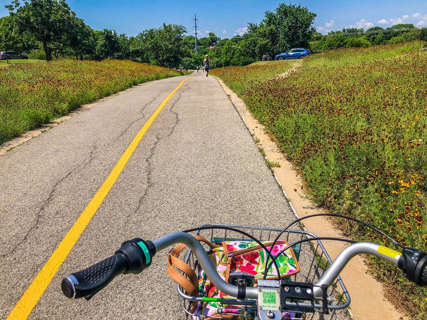 bicycle on the road under the blue sky