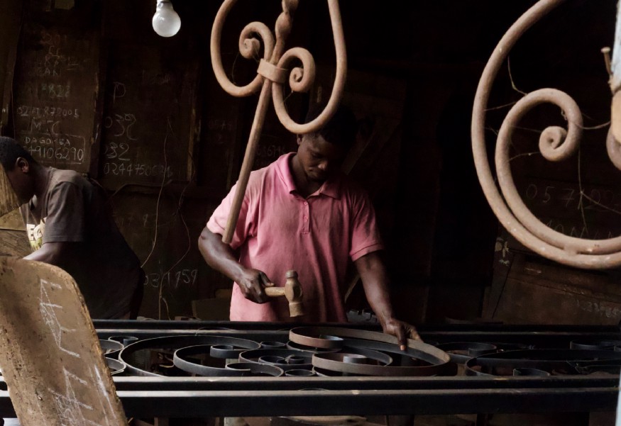 An African man working.