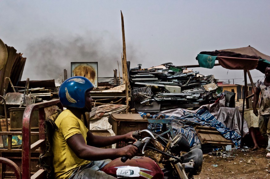 African man on a motorcycle.