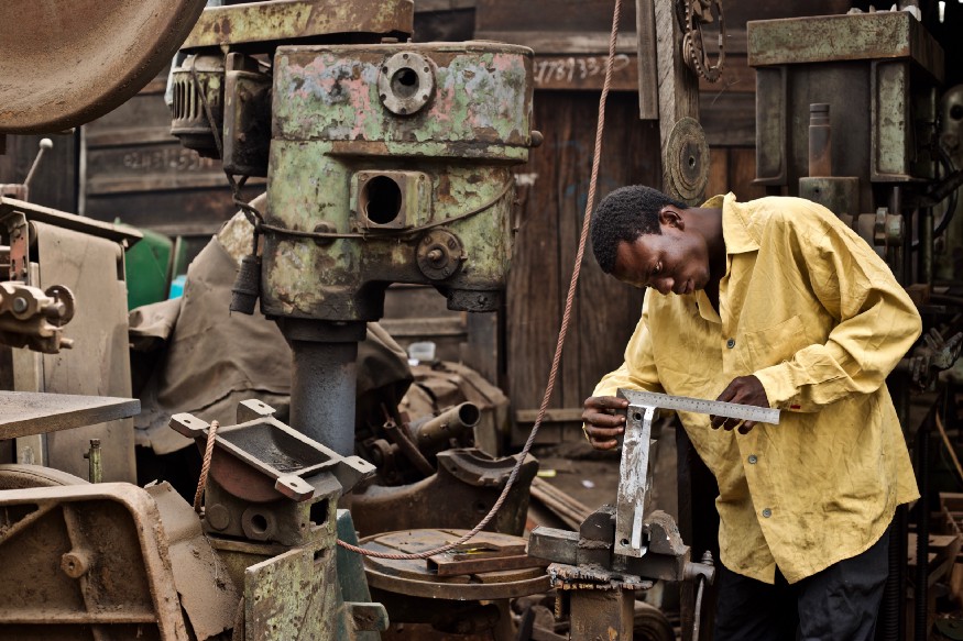 An African man working.