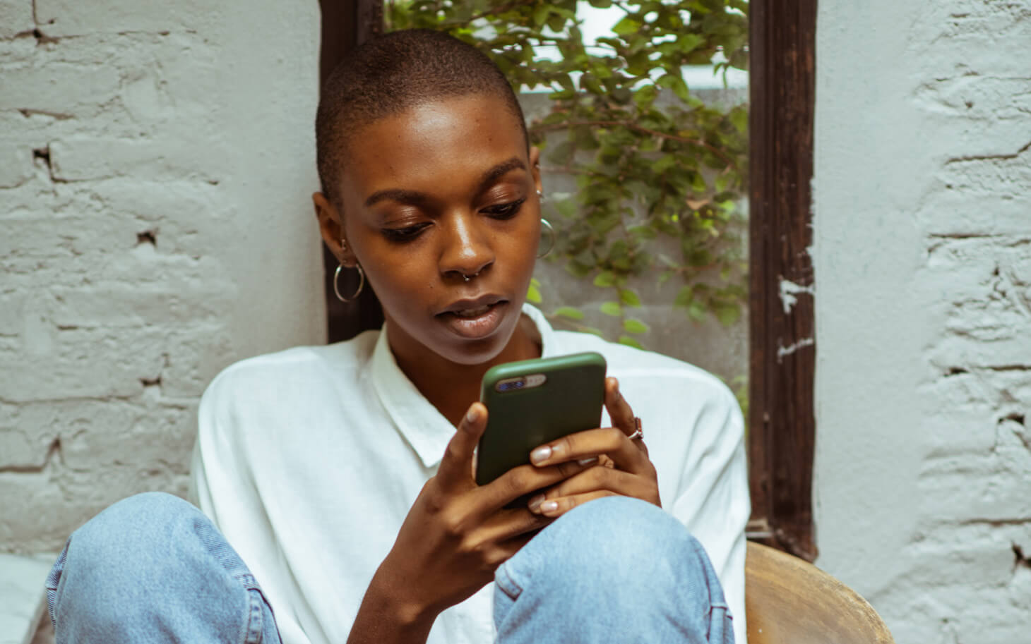 woman texting on phone