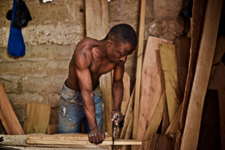 A young African carpenter.